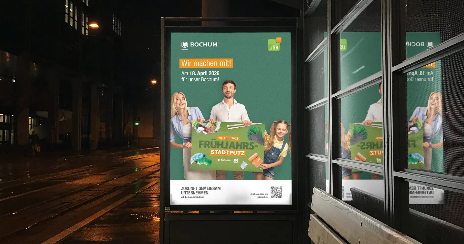 USB Frühjahrs-Stadtputz Bochum 2026 Citylight-Plakat an Bushaltestelle bei Nacht